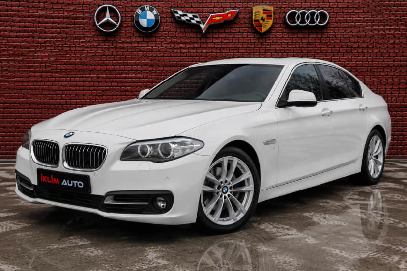 BMW 523i beyaz sedan İklim Auto ilan aracı